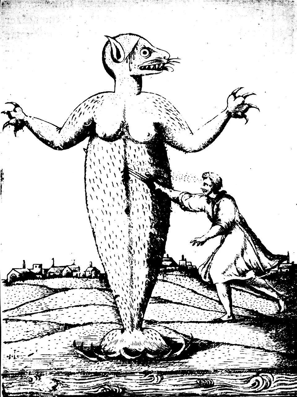 Black-and-white historical illustration of the ipupiara, a monstrous humanoid sea creature standing upright on land near the water’s edge. The creature has a broad, human-like torso covered in short hair, clawed hands raised outward, and a long, tapering lower body that ends like a seal or fish tail. Its head is animalistic, with pointed ears, a wide eye, whiskers, and sharp teeth. A human figure behind it reaches forward as if pushing or attacking the creature. In the background are rolling hills and a small settlement of buildings, rendered in a rough woodcut style.